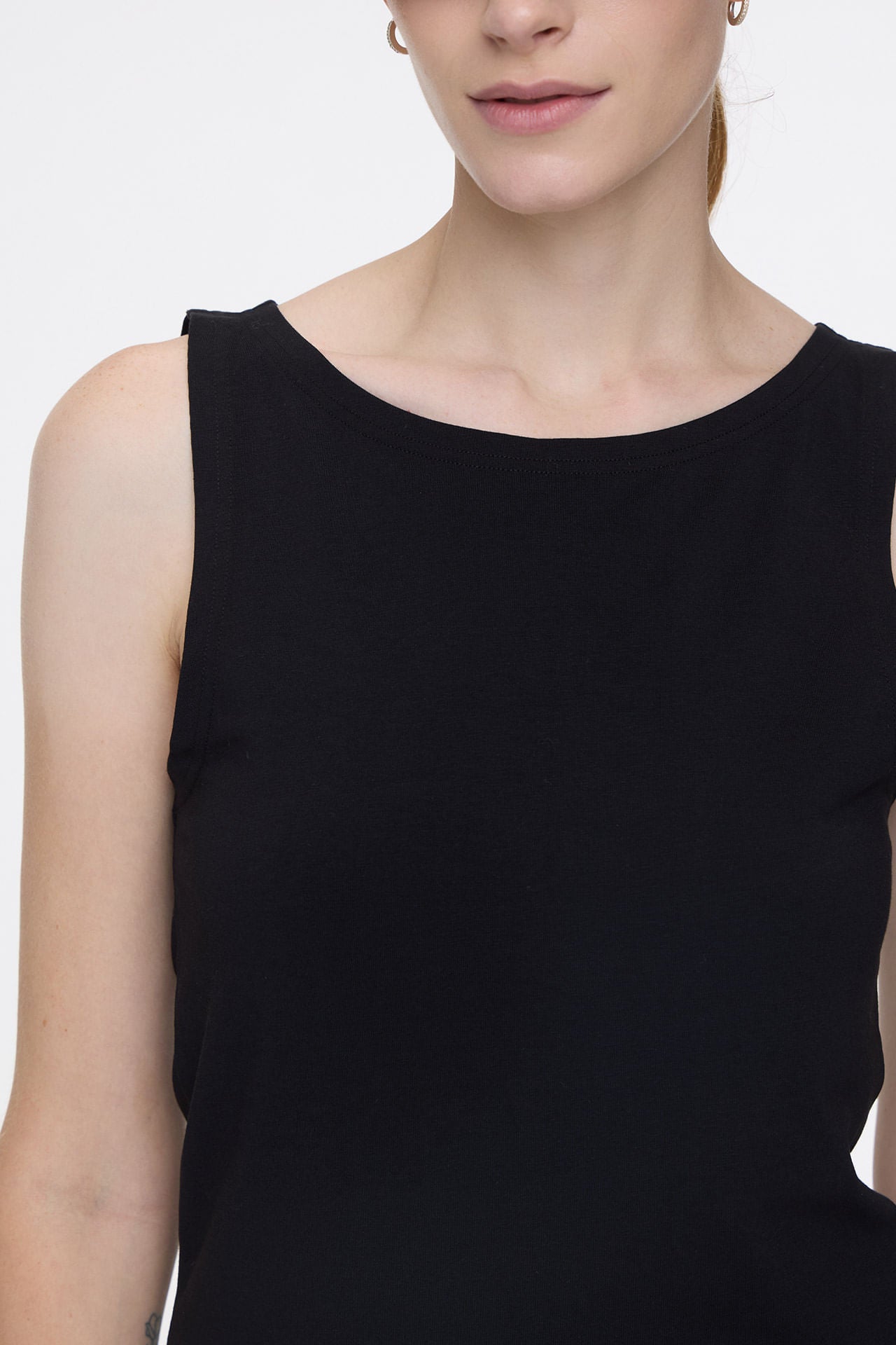 Musculosa Nina